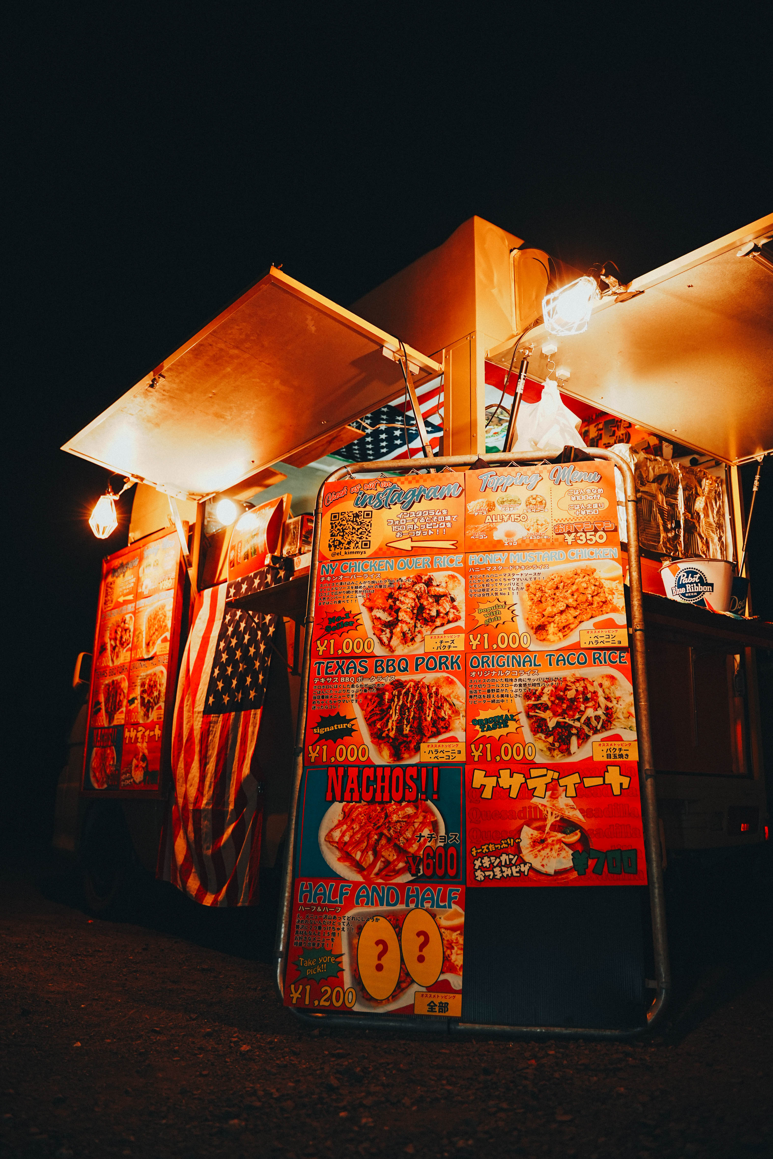Food truck menu board at night